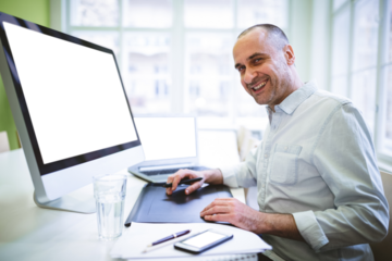 Portrait of man sitting on chair