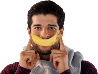 Close-up portrait of man holding banana