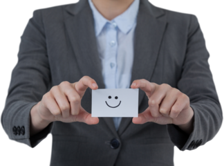 Businesswoman holding visitor card with smiley