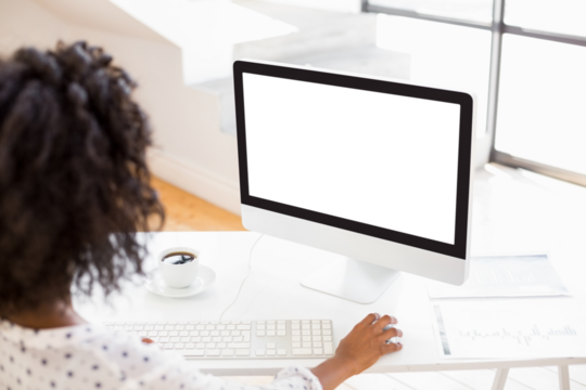 over the shoulder view of woman using computer