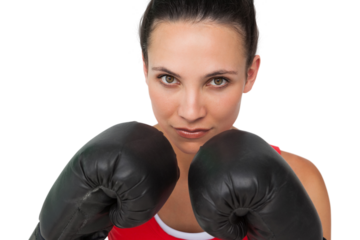 Close-up portrait of a determined female boxer