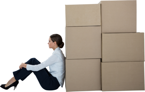 Businesswoman leaning on cardboard boxes against white background - Powered by Adobe