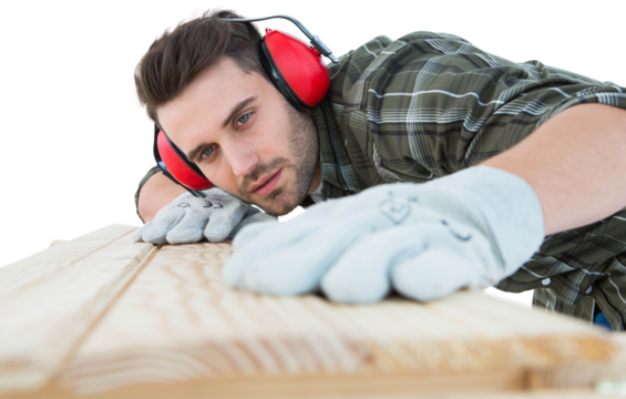 Carpenter measuring wooden plank