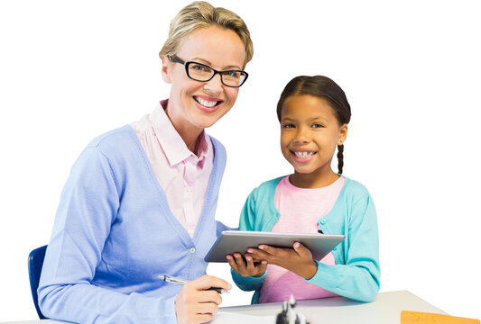 Portrait of student with teacher holding digital tablet