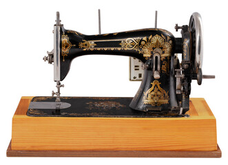 Old sewing machine on a wooden platform. Isolated background.