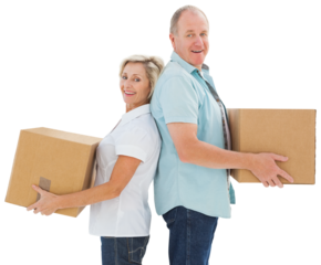 Happy older couple holding moving boxes