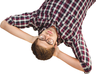 Hipster wearing eye glasses lying on hardwood floor