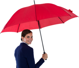 Portrait of smiling businesswoman holding red umbrella