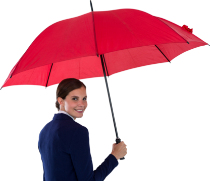 Portrait of smiling businesswoman holding red umbrella - Powered by Adobe