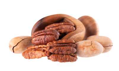 Pecan nuts in wooden scoop, isolated on white background. Shelled and unshelled pecan. Clipping path.