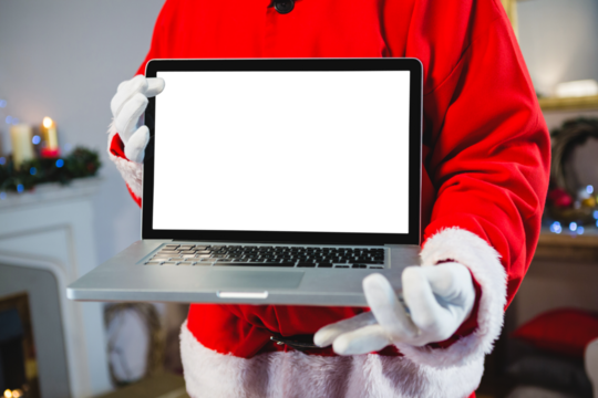 Santa claus holding a laptop