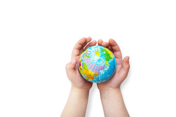 Environment for future, save the planet concept. World globe in child hands top view with copy space