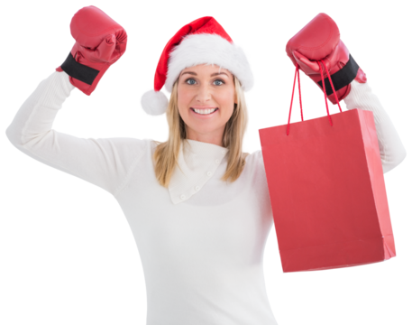 Festive blonde in boxing gloves with shopping bag