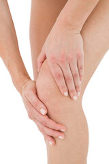 Fototapeta na wymiar Natural woman touching her painful knee 