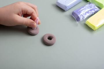 Creating a doll cake donut from air plasticine. Children's creativity DIY