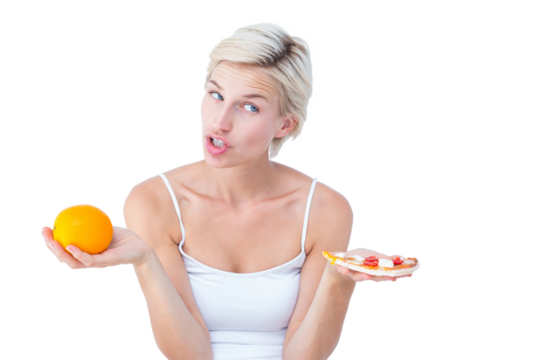 Pretty woman deciding between pizza and an orange - Powered by Adobe