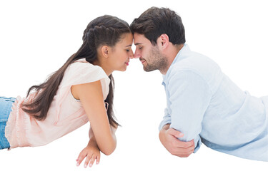 Attractive young couple smiling at each other