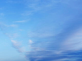Blue sky with white clouds. Background for design purpose and sky replacement.