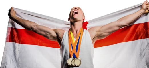 Athlete posing with gold medals after victory