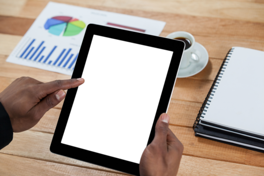Close up of businessman using digital tablet
