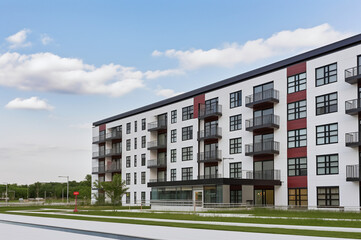 Obraz premium Modern apartment building exterior with balconies 