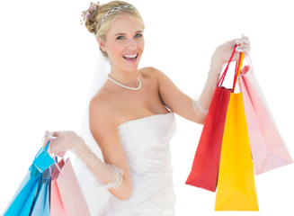 Bride holding shopping bags over white background