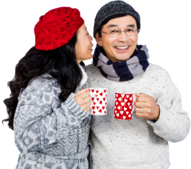 Older asian couple having hot drinks