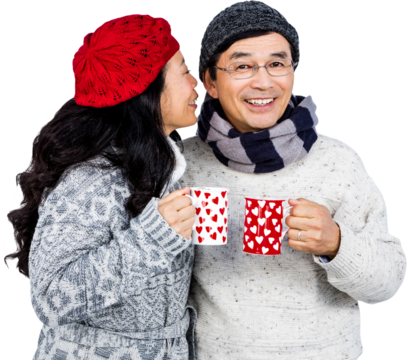 Older asian couple having hot drinks - Powered by Adobe