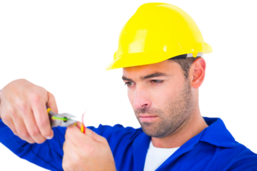 Electrician wearing hard hat while cutting wire
