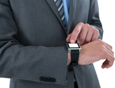 Businessman checking smart watch