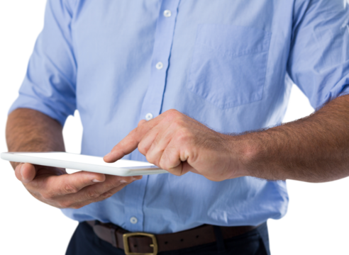 Mid section of man using digital tablet