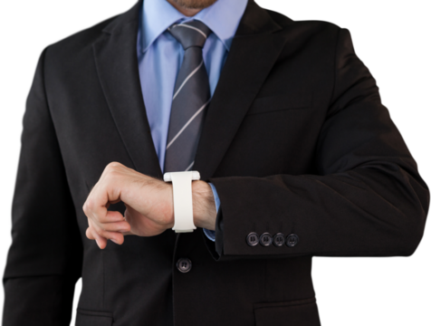 Mid section of businessman wearing smart watch