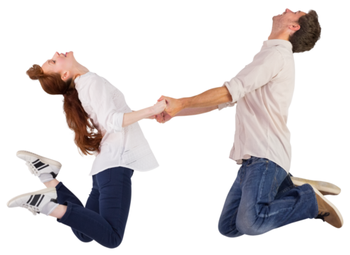 Couple jumping and holding hands - Powered by Adobe