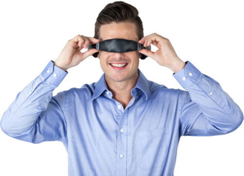 Smiling man wearing virtual reality simulator