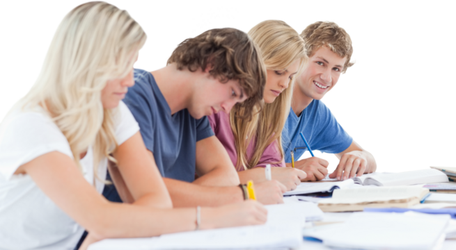Students writing in the book 