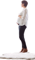 Pregnant woman standing on rug over white background