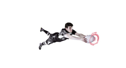 Composite image of rugby player in mid air about to score