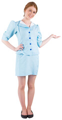 Pretty air hostess presenting with hand