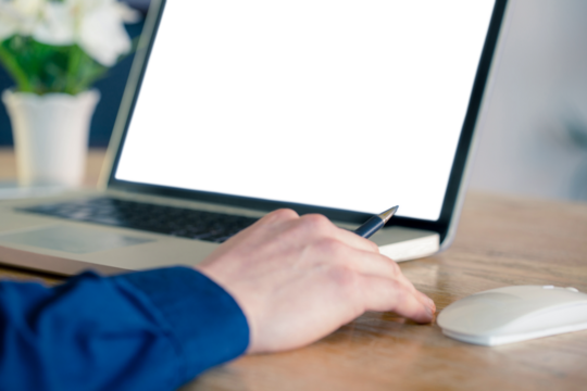 Businessman using laptop in office