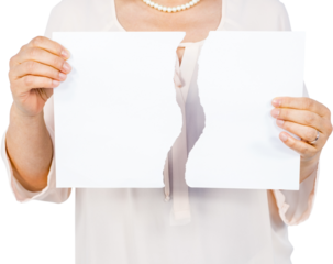 Woman holding ripped page