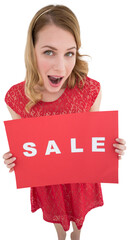 Surprised blonde showing a red sale poster