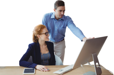 Colleagues discussing over computer at table