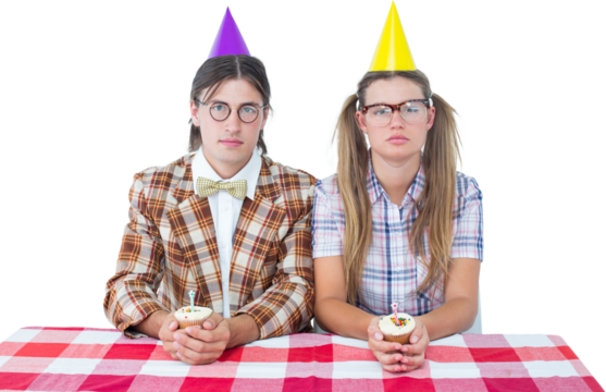 Unsmiling geeky hipsters celebrating birthday 