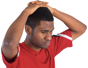 Disappointed football fan looking down