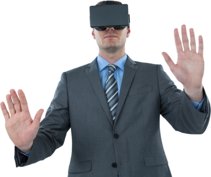 Businessman gesturing while using virtual reality headset