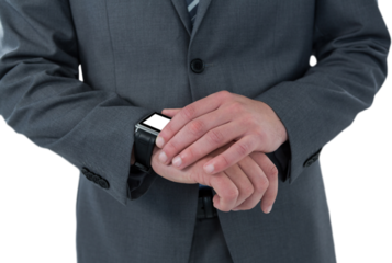 Businessman checking smart watch
