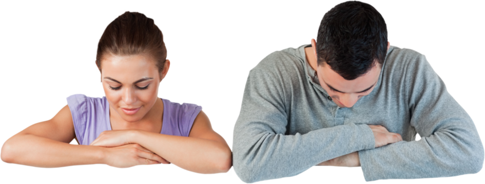 Young couple looking down to an advertisement