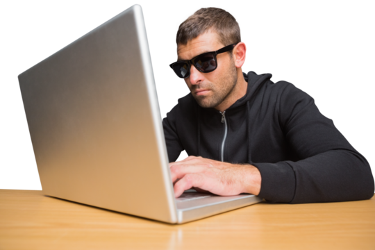 Hacker using laptop to steal identity