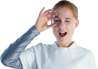 Portrait of businesswoman with mouth open adjusting imaginary eyeglasses