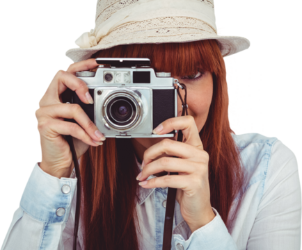 Attractive hipster photographing with camera - Powered by Adobe